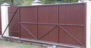 Купить откатные ворота из профнастила Барабинск, цена от 1733 руб.