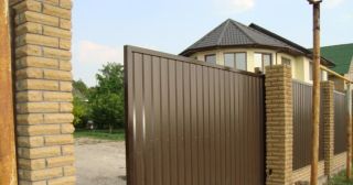 Купить откатные ворота из профнастила Барабинск, цена от 1733 руб.